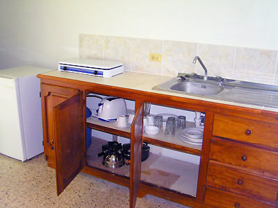 Kitchen in 1br Suite